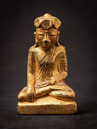 Burmese wooden Buddha statue in bhumisparsha mudra, full-front view with inscription on the base