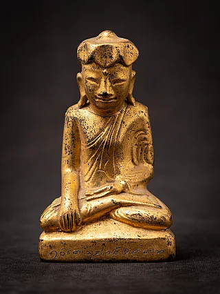 Burmese wooden Buddha statue in bhumisparsha mudra, full-front view with inscription on the base