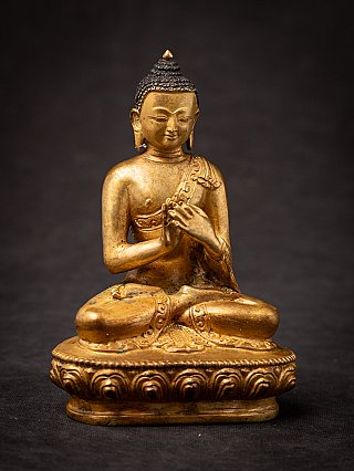 Buddha-Statue aus Bronze aus Nepal, frontal mit Lotussockel und Dharmachakra-Mudra