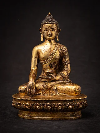 Nepalesische Buddha-Statue aus Bronze, sitzend in Bhūmisparśa-Mudrā auf Lotussockel, Frontansicht