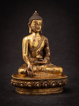 Nepalesische Buddha-Statue aus Bronze auf Lotussockel, Dreiviertelansicht mit Händen in Bhūmisparśa