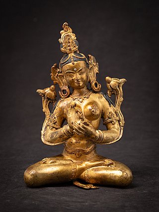 Nepali Green Tara bronze statue seated with dharmachakra mudra, full front view