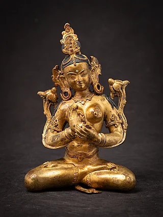 Nepali Green Tara bronze statue seated with dharmachakra mudra, full front view