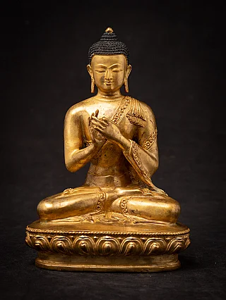 Nepalesische Buddha-Statue aus Bronze, sitzend in Dharmachakra-Mudra, Frontalansicht auf Lotus-Sockel