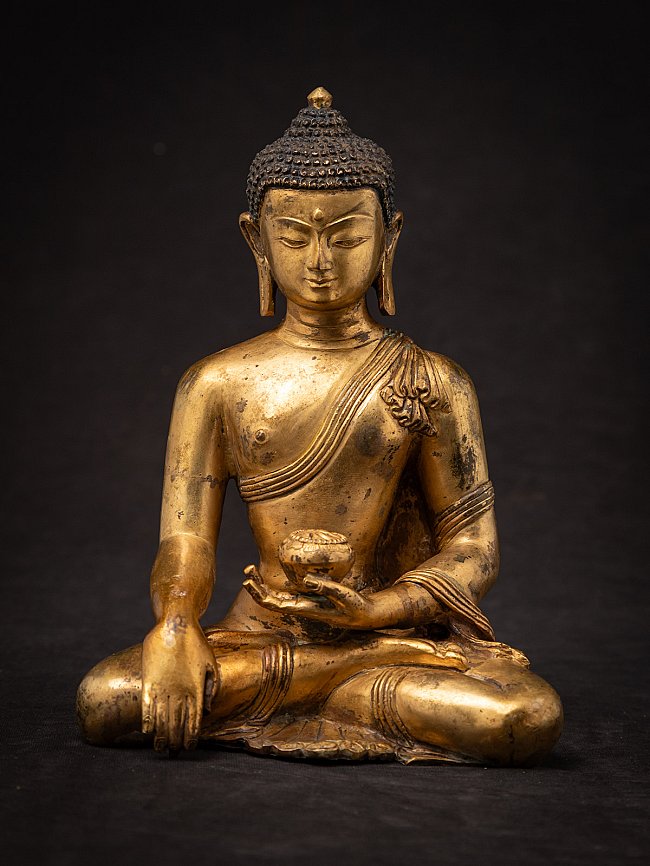 Old bronze Nepali Buddha statue