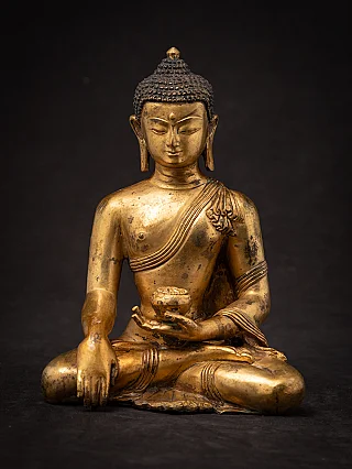 Old bronze Nepali Buddha statue
