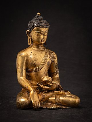Old bronze Nepali Buddha statue
