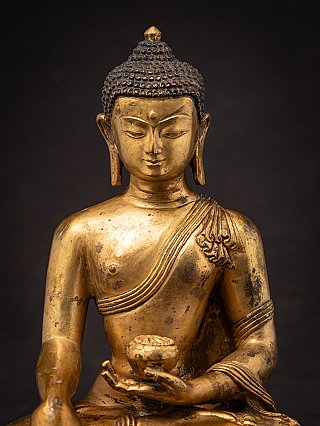 Old bronze Nepali Buddha statue