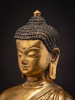 Old bronze Nepali Buddha statue