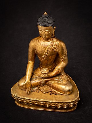Nepali bronze Buddha statue, angled full view from above showing bowl and seated posture