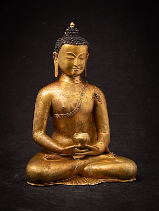 Old bronze Nepali Buddha statue