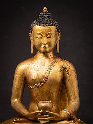 Old bronze Nepali Buddha statue