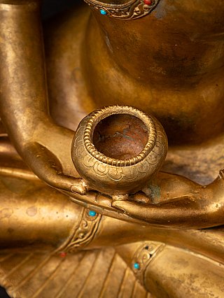 Old bronze Nepali Buddha statue