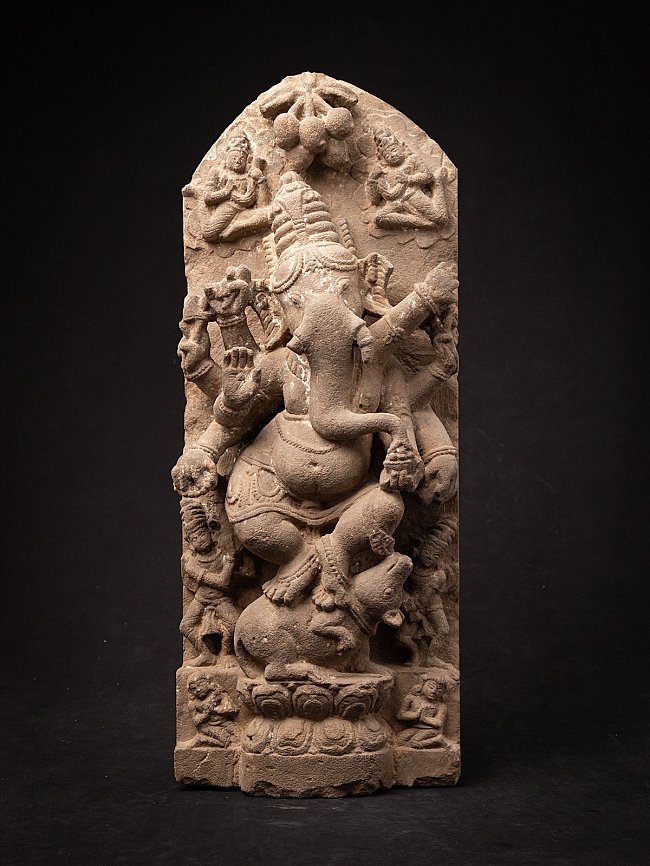 Indian sandstone Ganesha relief panel, full front view with attendant figures and arched top