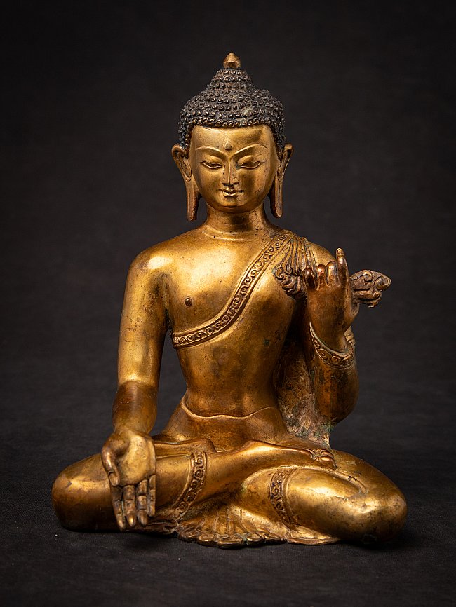 Old bronze Nepali Buddha statue
