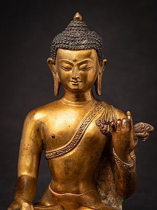 Old bronze Nepali Buddha statue