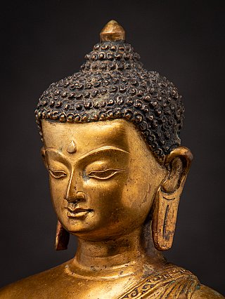 Old bronze Nepali Buddha statue