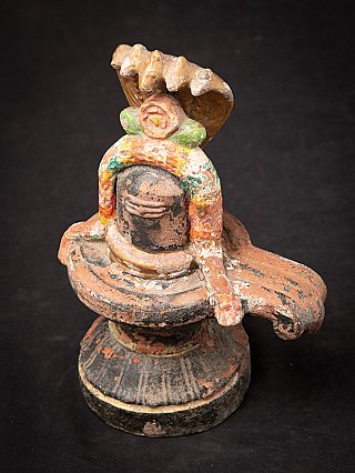 Top-angled view of the terracotta Shiva lingam, showing the spout and cobra canopy