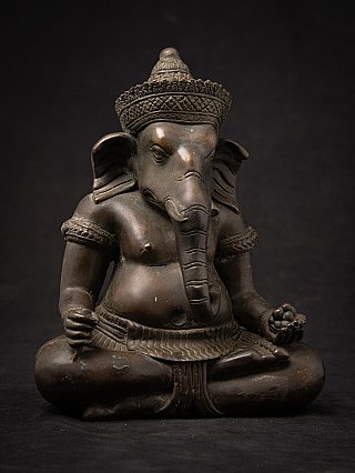 Ganesha statue in bronze, three-quarter view with both ears and hands visible