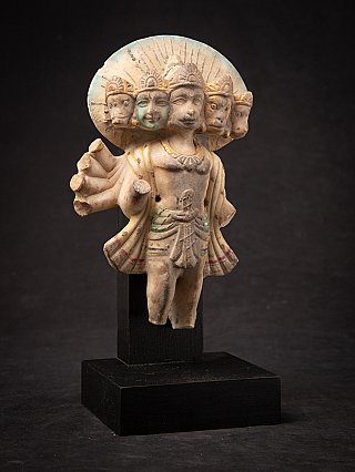 Panchamukhi Hanuman marble statue from India, angled front view with traces of paint and gilding