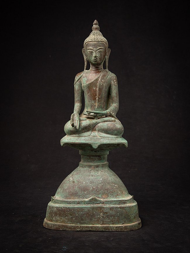 Burmese bronze Buddha statue seated in Varada mudra, full front view on tall base
