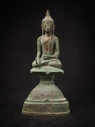 Burmese bronze Buddha statue seated in Varada mudra, full front view on tall base