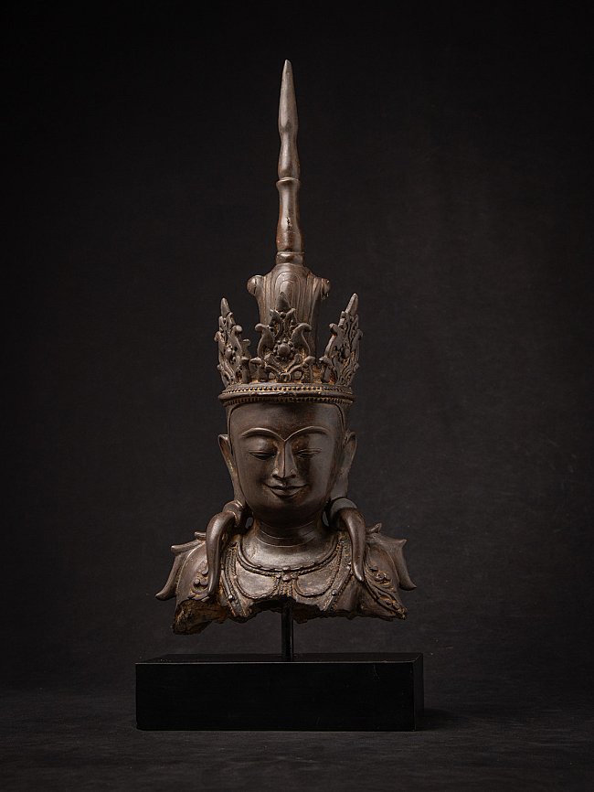 Burmese bronze Buddha head, front view on stand with tall crown and serene face