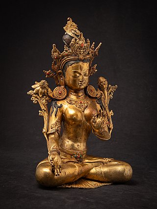 Bronzen Witte Tara uit Nepal met uitgewerkte kroon, driekwartaanzicht rechts