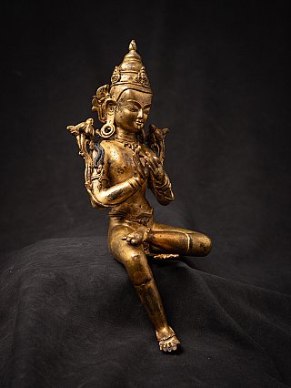 Nepali bronze Bodhisattva statue seated with dharmachakra mudra, three-quarter right view
