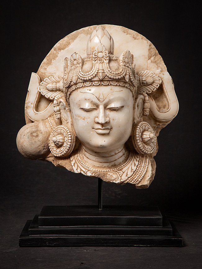 Large antique Indian marble Bodhisattva head with crown and ear ornaments, front view