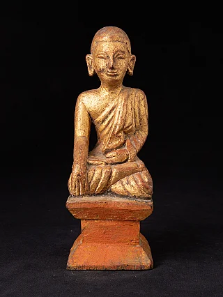 Antique Burmese monk statue