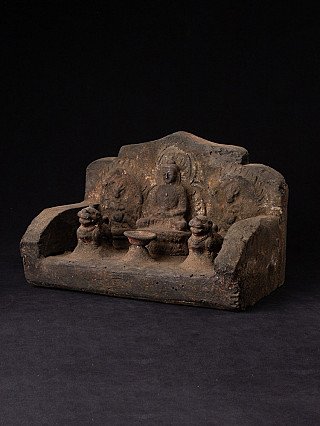 Wooden Buddha altar from Nepal with seated Buddha, three-quarter left view