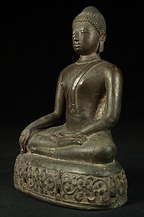 Bronze Buddha statue from Thailand, three-quarter left view, seated on an ornate base