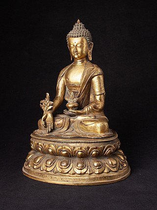 Medizinbuddha-Statue aus Bronze, Nepal, in Dreiviertelansicht sitzend mit Schale und herabgestreckter Hand