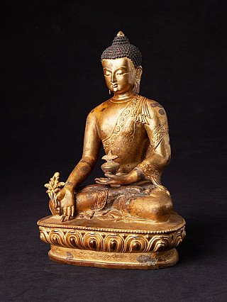 Medizinbuddha-Statue aus Bronze, Nepal, in Dreiviertelansicht mit Lotussockel