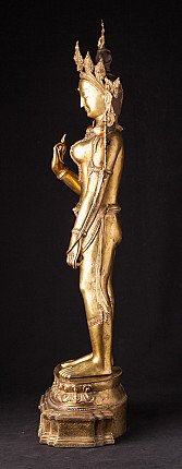 Stehende Tara aus Bronze aus Nepal, Seitenansicht mit Kronenprofil und Blütenstiel hinter dem Arm