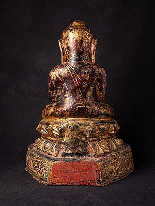 Wooden Ava Buddha statue from Burma (Myanmar), rear view with worn gilded surface