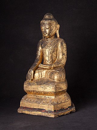 Shan Buddha statue from Burma in lacquerware, three-quarter left view with tiered base