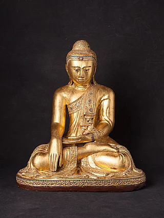 Antique wooden Mandalay Buddha statue