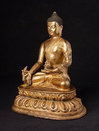 Bronze-Statue des Medizinbuddha aus Nepal, Dreiviertelansicht von links