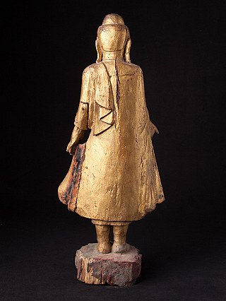 Mandalay wooden Buddha statue, rear view showing the long seam down the back