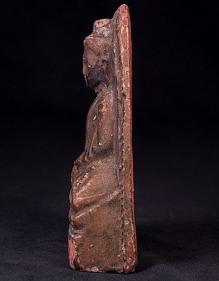 Buddha statue amulet from Myanmar, side profile with relief figure and flat back plate