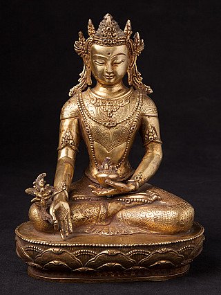 Bekrönte bronzene Medizinbuddha-Statue aus Nepal, sitzend auf Lotussockel, Frontalansicht
