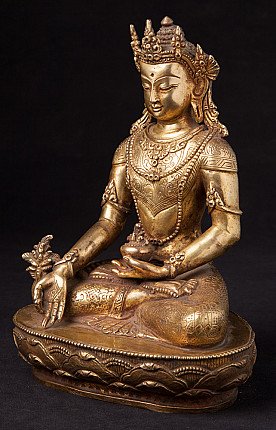 Bronzene Medizinbuddha-Statue mit Krone, Nepal, sitzend in Dreiviertelansicht von links