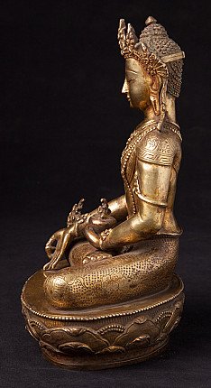 Bekrönte nepalesische Buddha-Statue aus Bronze, sitzend im linken Seitenprofil auf Lotussockel