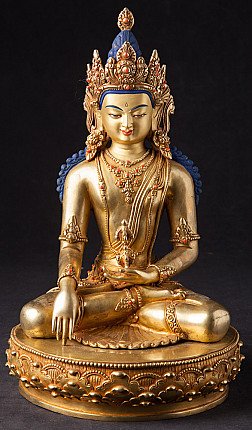 Bronze Buddha statue from Nepal, seated in bhumisparsha mudra on a round base, full front
