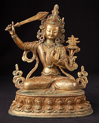 Nepalese bronzen Manjushri-beeld op lotussokkel, met zwaard en sieraden, vooraanzicht