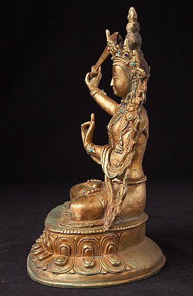 Manjushri bronzen beeld uit Nepal, zittend op lotussokkel, zijaanzicht met zwaardarm