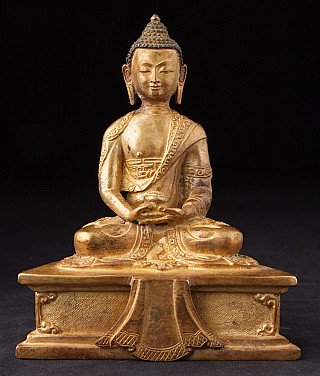 Bronze Buddha statue from Nepal, full front view, seated with hands in dhyana mudra on base