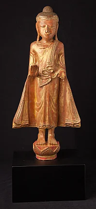Antique standing Mandalay Buddha statue